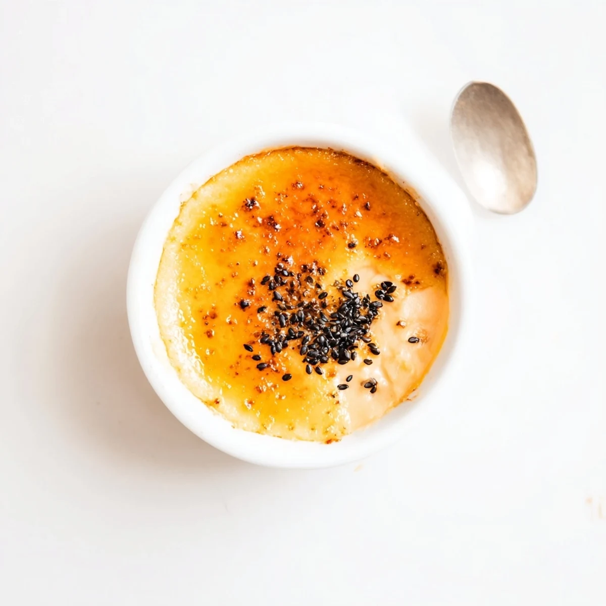 Creamy orange custard beneath a crisp burnt sugar layer in this Japanese sweet potato crème brûlée