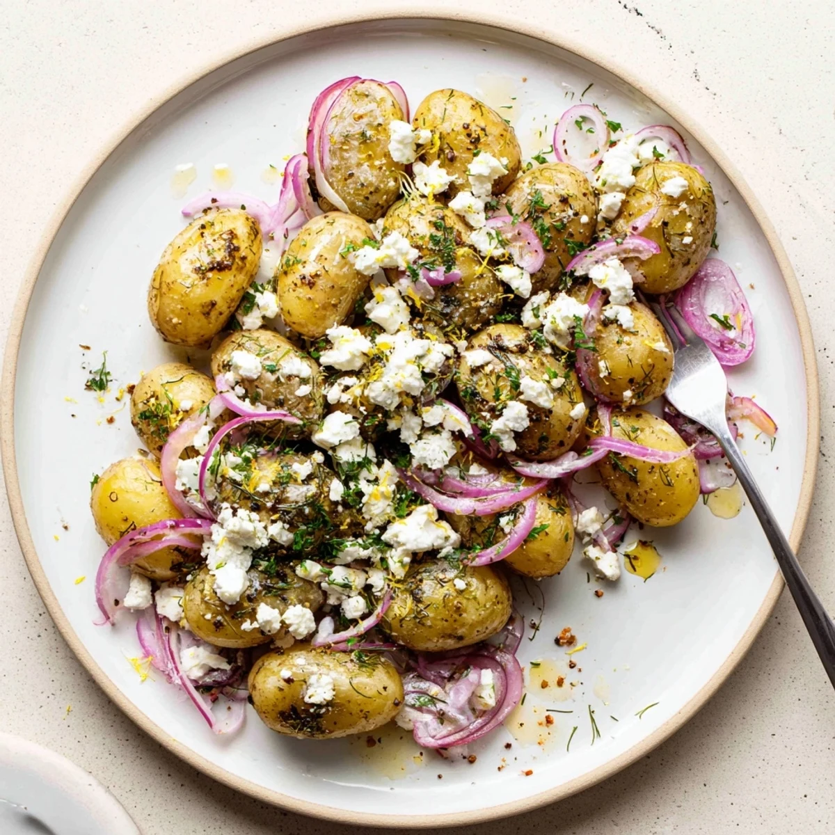 Crowd-pleasing Baked Feta Potatoes, tender baby potatoes, garlic-scented and bubbly.