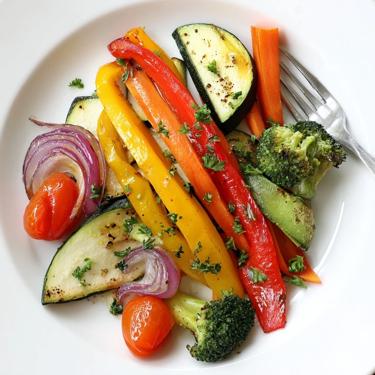 Garlic Infused Olive Oil Sauteed Veggies glisten with parsley, served warm from skillet.