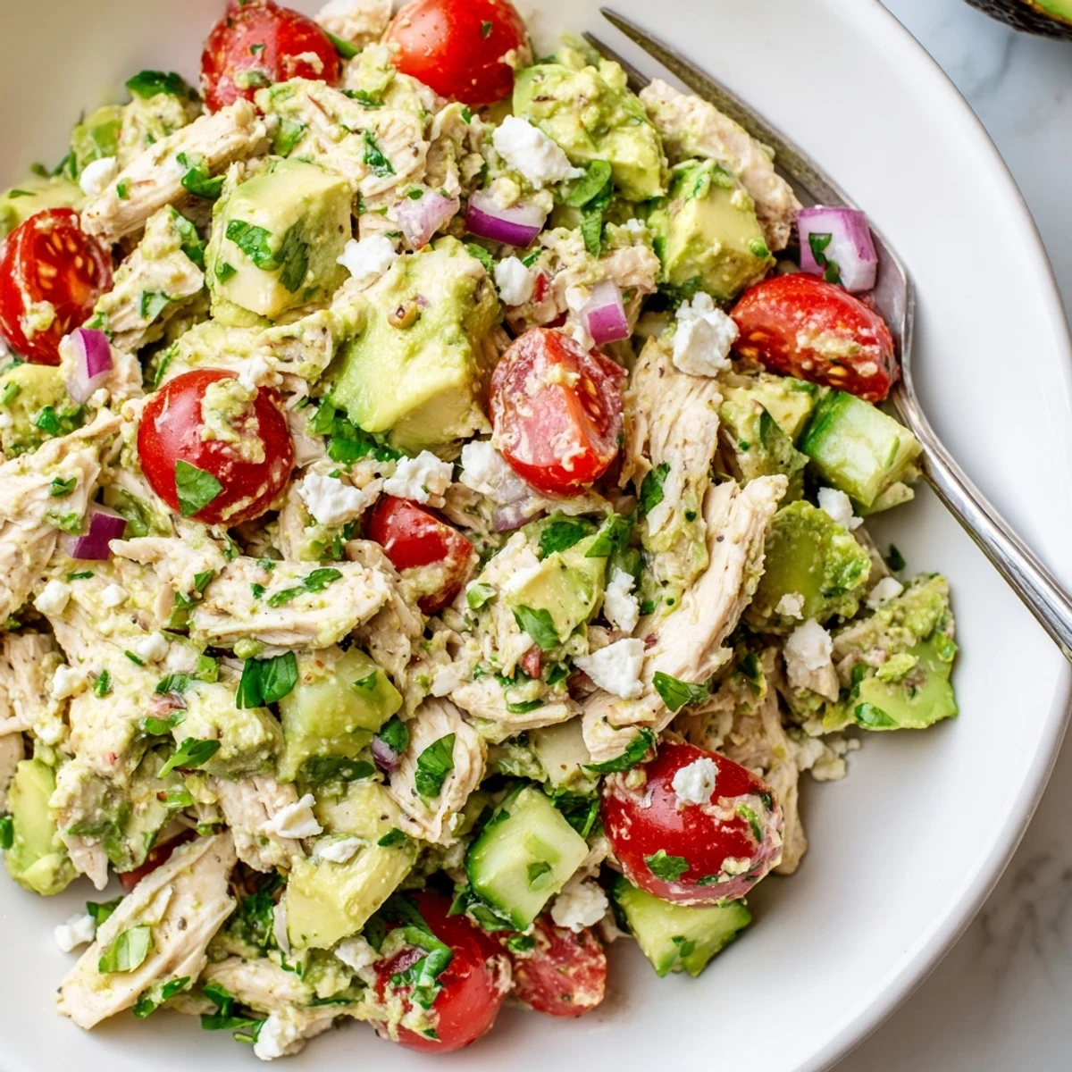 Avocado Chicken Salad with tender chicken and creamy avocado, lime scented and chilled