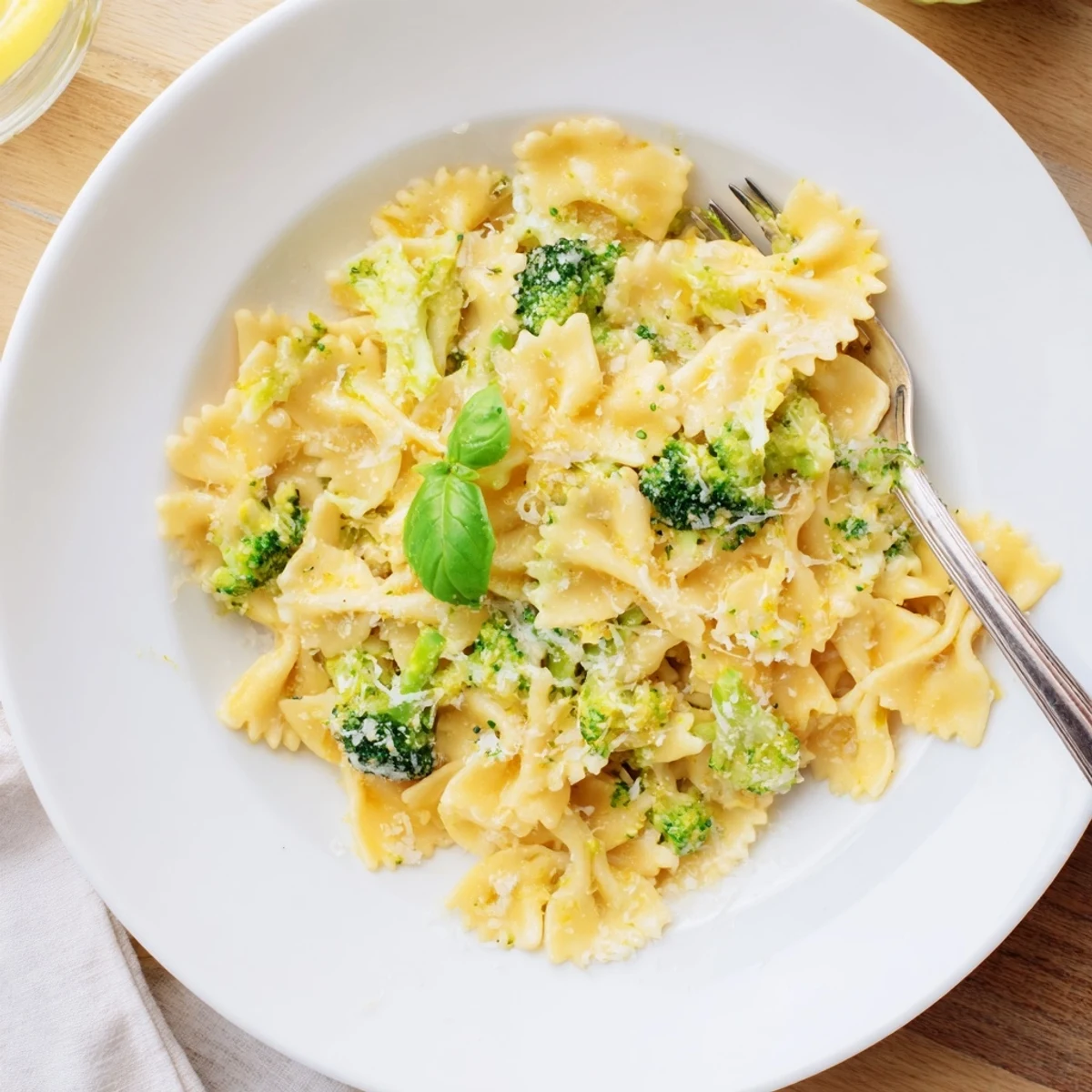 Creamy Mafaldine Pasta Limone Broccoli with tender florets in a bright lemon Parmesan sauce