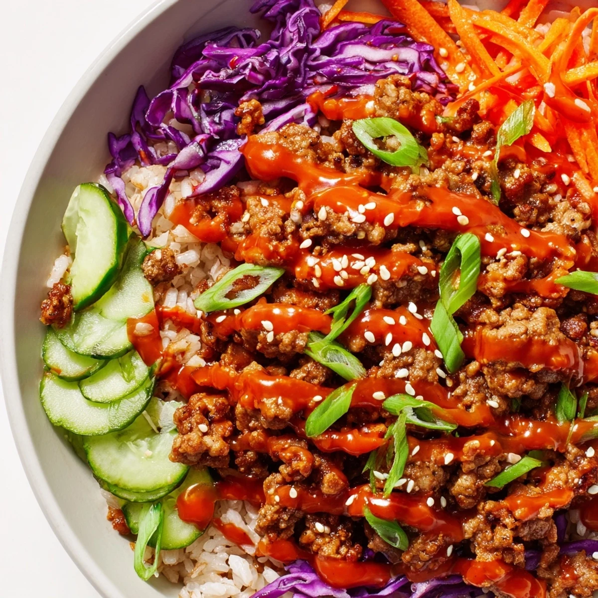 Seasoned ground turkey piled over fluffy jasmine rice with creamy, zesty Bang Bang sauce
