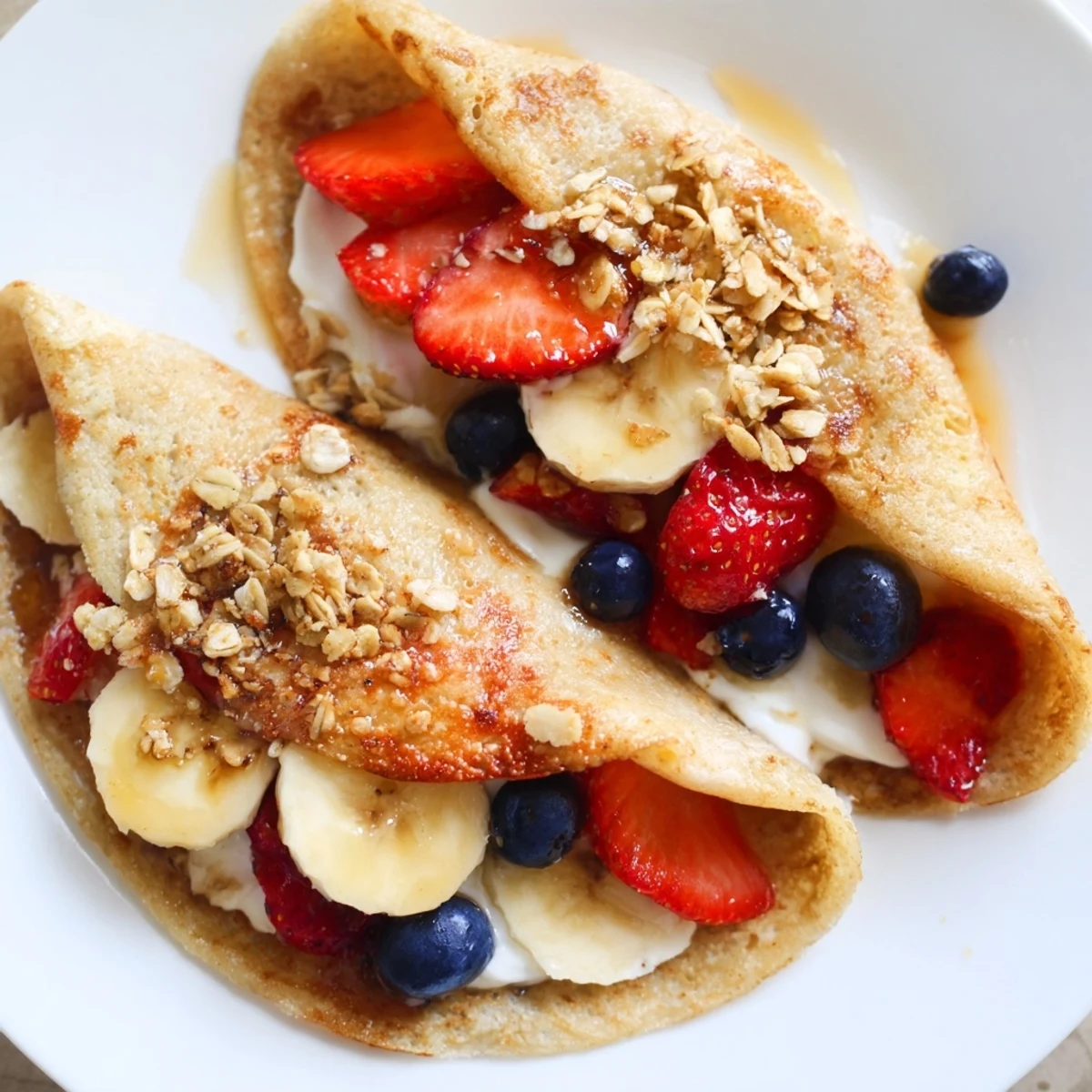 Golden pancake tacos stuffed with scrambled eggs and crumbled bacon for a savory breakfast